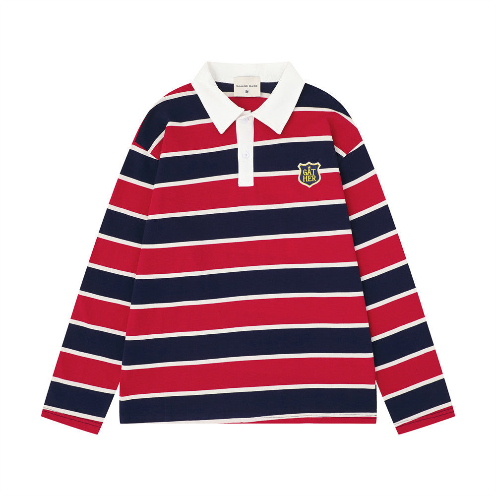 Men's oversized long sleeve striped polo shirt in red and navy horizontal stripes with white collar and woven crest badge