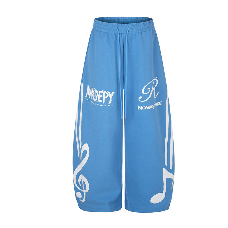 Pantalon de survêtement à jambes larges avec motif notes de musique – Jogging baggy streetwear