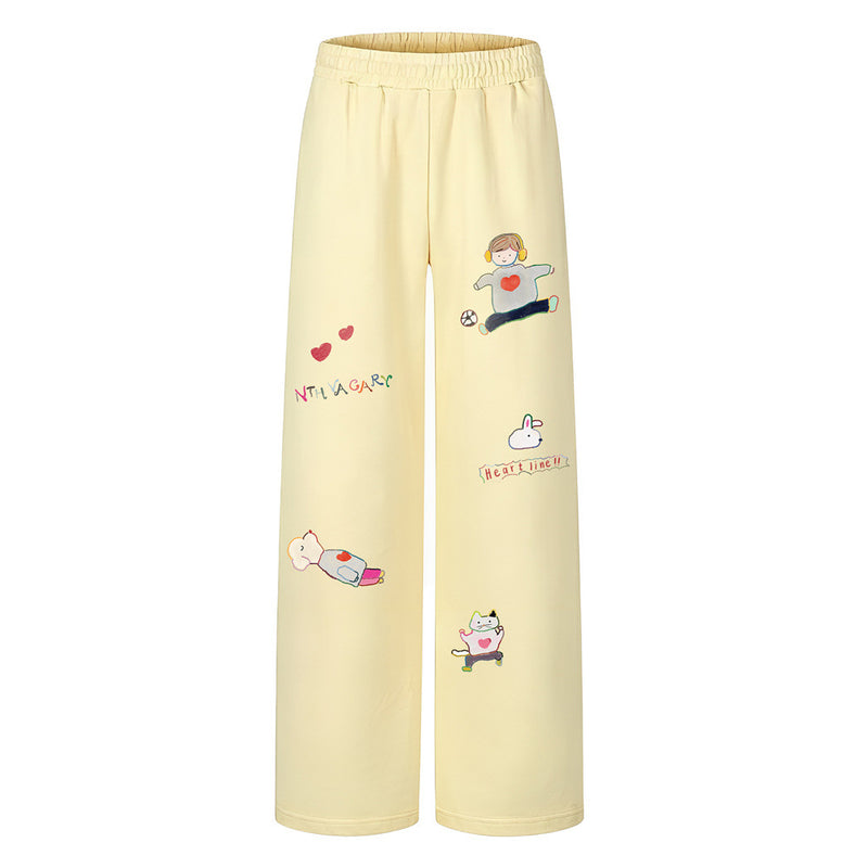 Sweatpants mit weitem Bein und handgezeichnetem Cartoonfiguren- und Herz-Print in Blassgelb, elastischem Bund und gerader Beinsilhouette