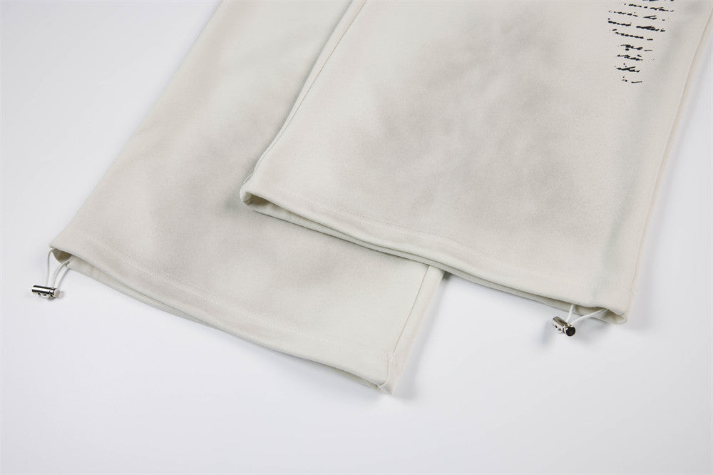 Pantalon de survêtement à jambes larges motif baroque – Imprimé usé, ceinture à étoiles