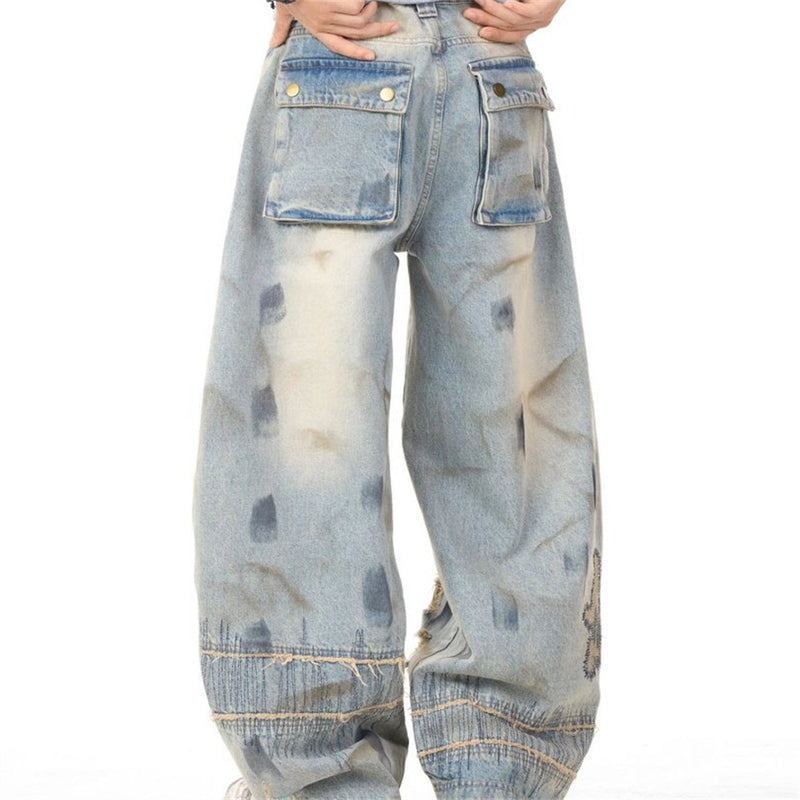 Men's Distressed Wide-Leg Jeans with Chaotic Embroidery & Metal Eyelet Detail