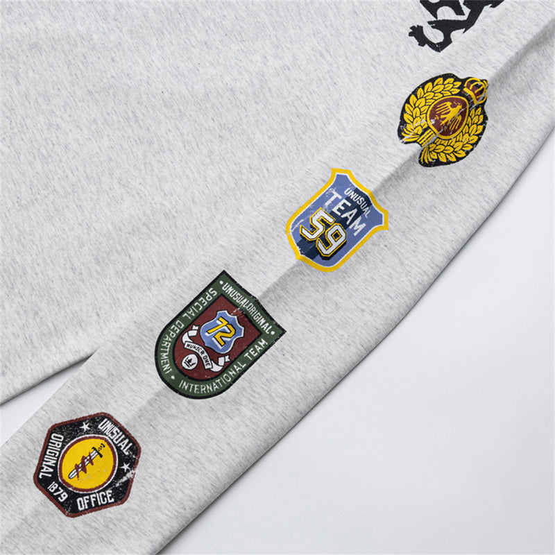 Maillot de soccer homme à manches longues et col en V avec écussons