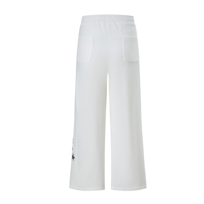 Pantalon de survêtement wide leg avec écusson varsity et motif graphique numéro 28