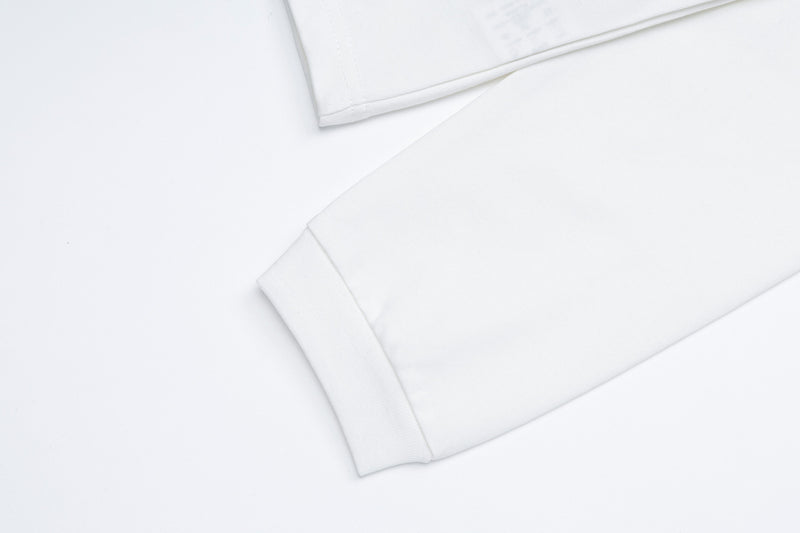 The Woodlise Langarm-Poloshirt – Adler-Grafikprint, Retro-Campus-Style