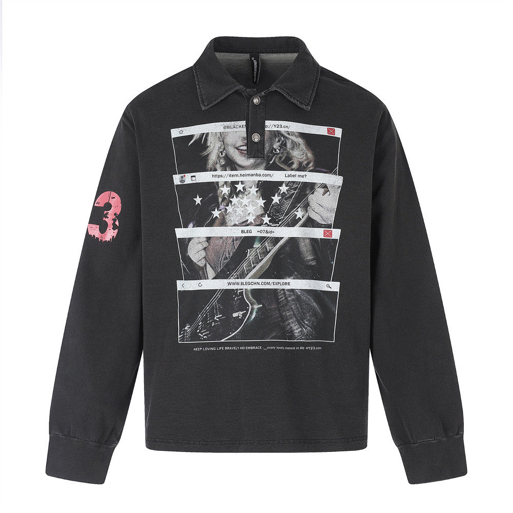 Black long sleeve polo shirt front view with collar, button placket, and large graphic print