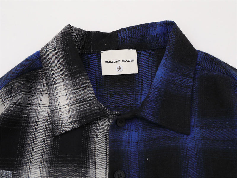 Close-up of collar and neck label on plaid colorblock button-up shirt