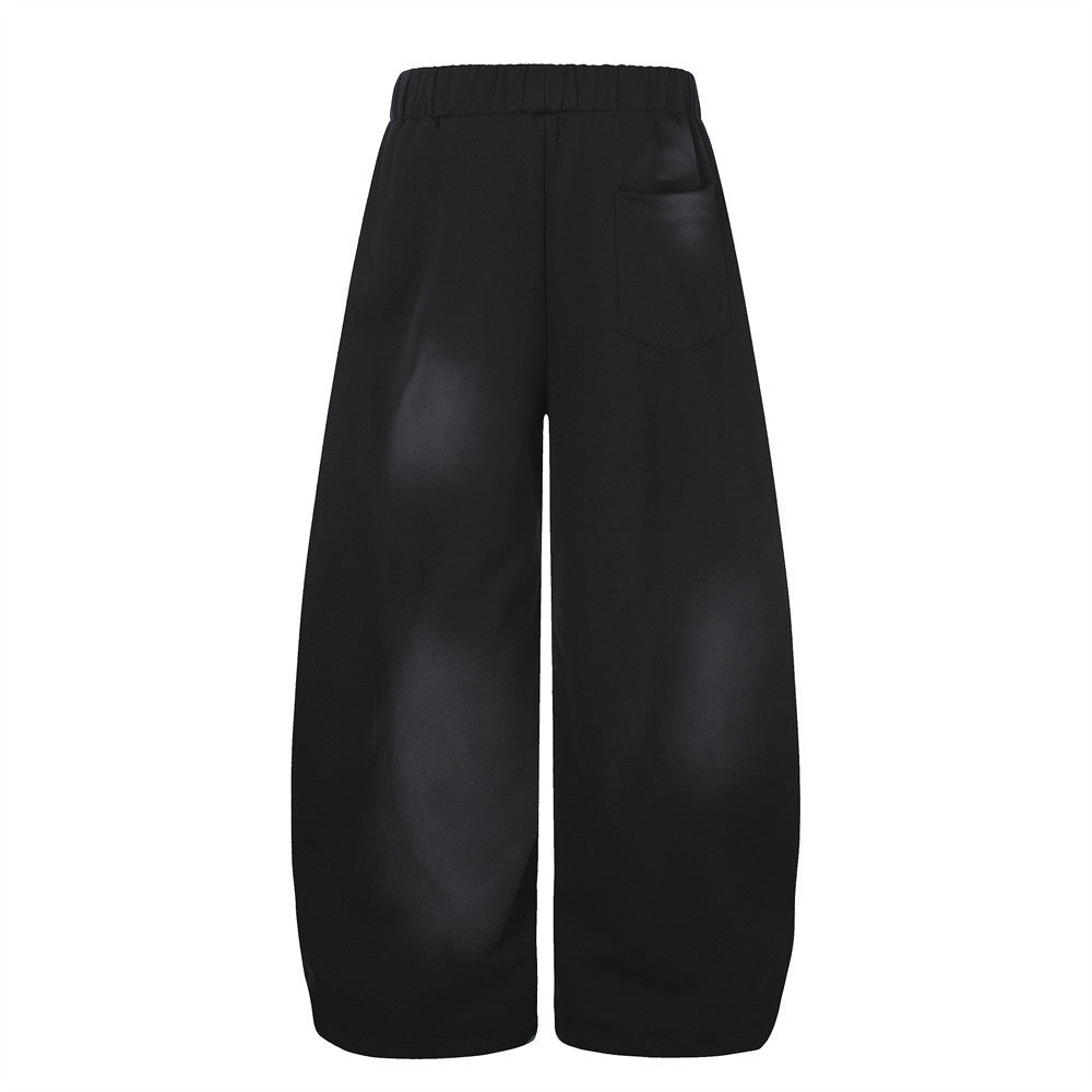 Pantalones de chándal holgados de pernera ancha con lavado efecto spray y gráfico de letras