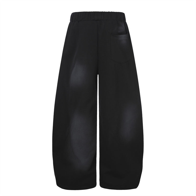 Pantalones de chándal holgados de pernera ancha con lavado efecto spray y gráfico de letras