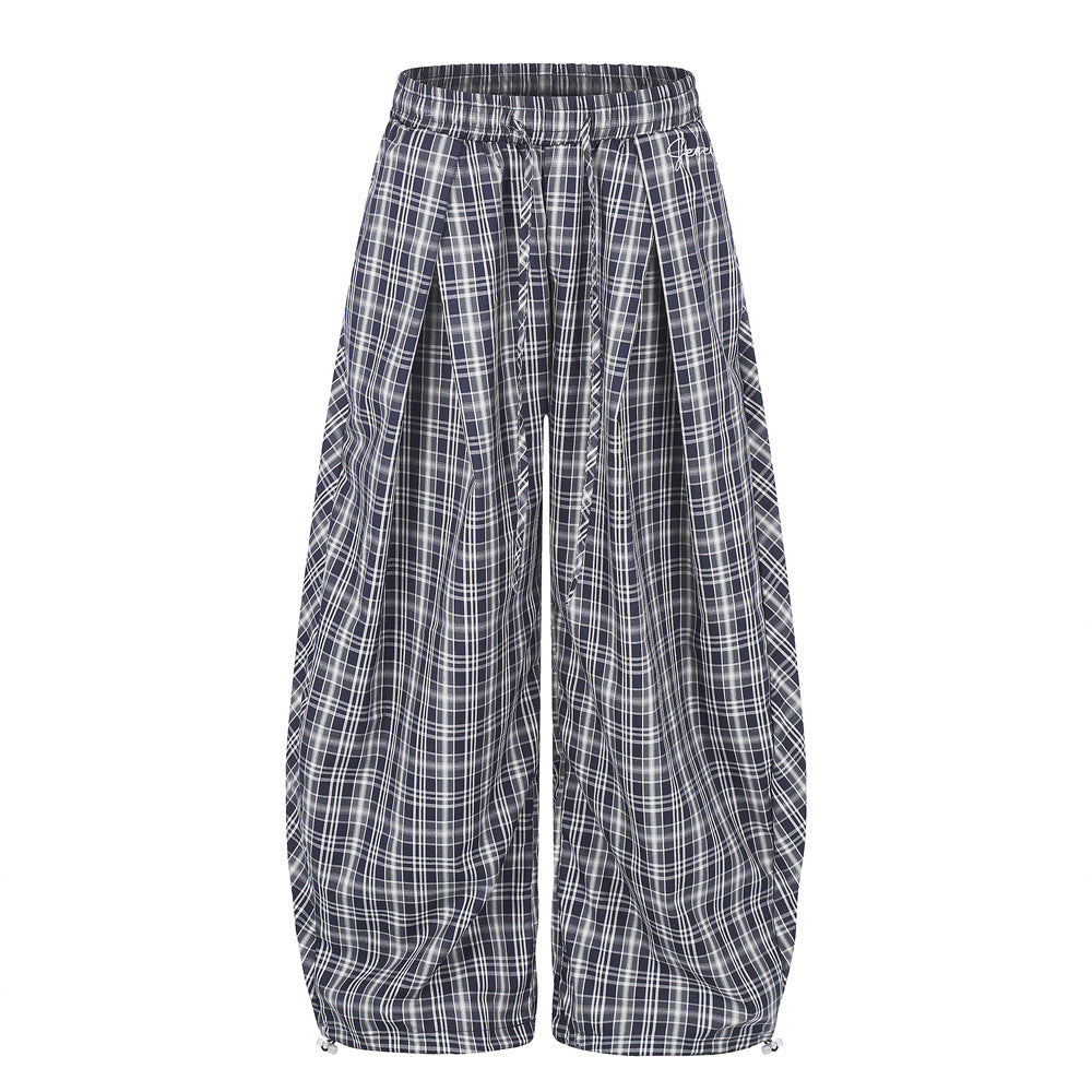 Men's oversized navy plaid wide-leg baggy trousers with elastic drawstring waist and hem zipper adjusters