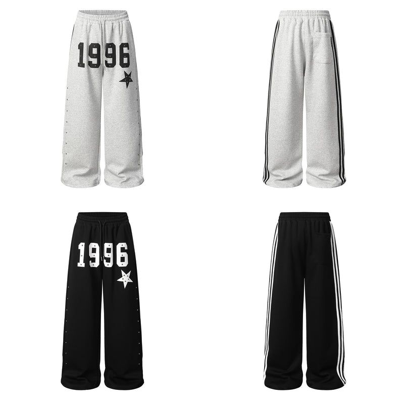 Pantalon de survêtement à jambes larges clouté d’étoiles 1996 avec détail à trois bandes