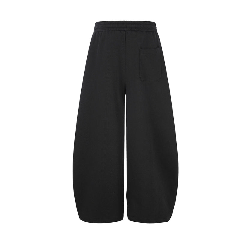 Pantalon de survêtement à jambes larges avec écusson licorne et imprimé graffiti – Streetwear noir