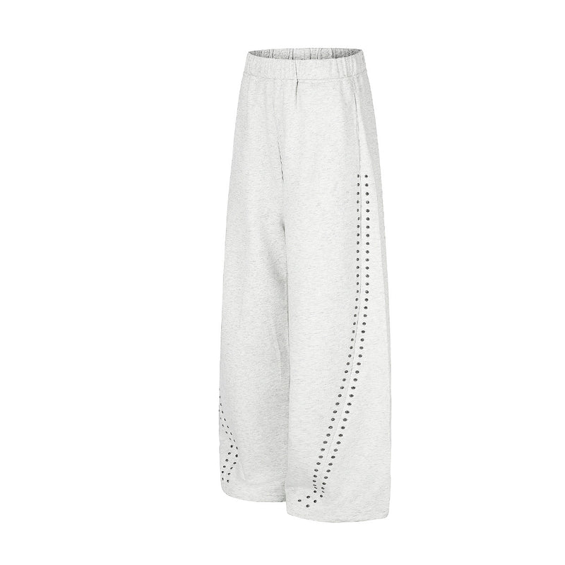 Jogging à jambes larges avec clous – Coupe ample et croix ornée de strass