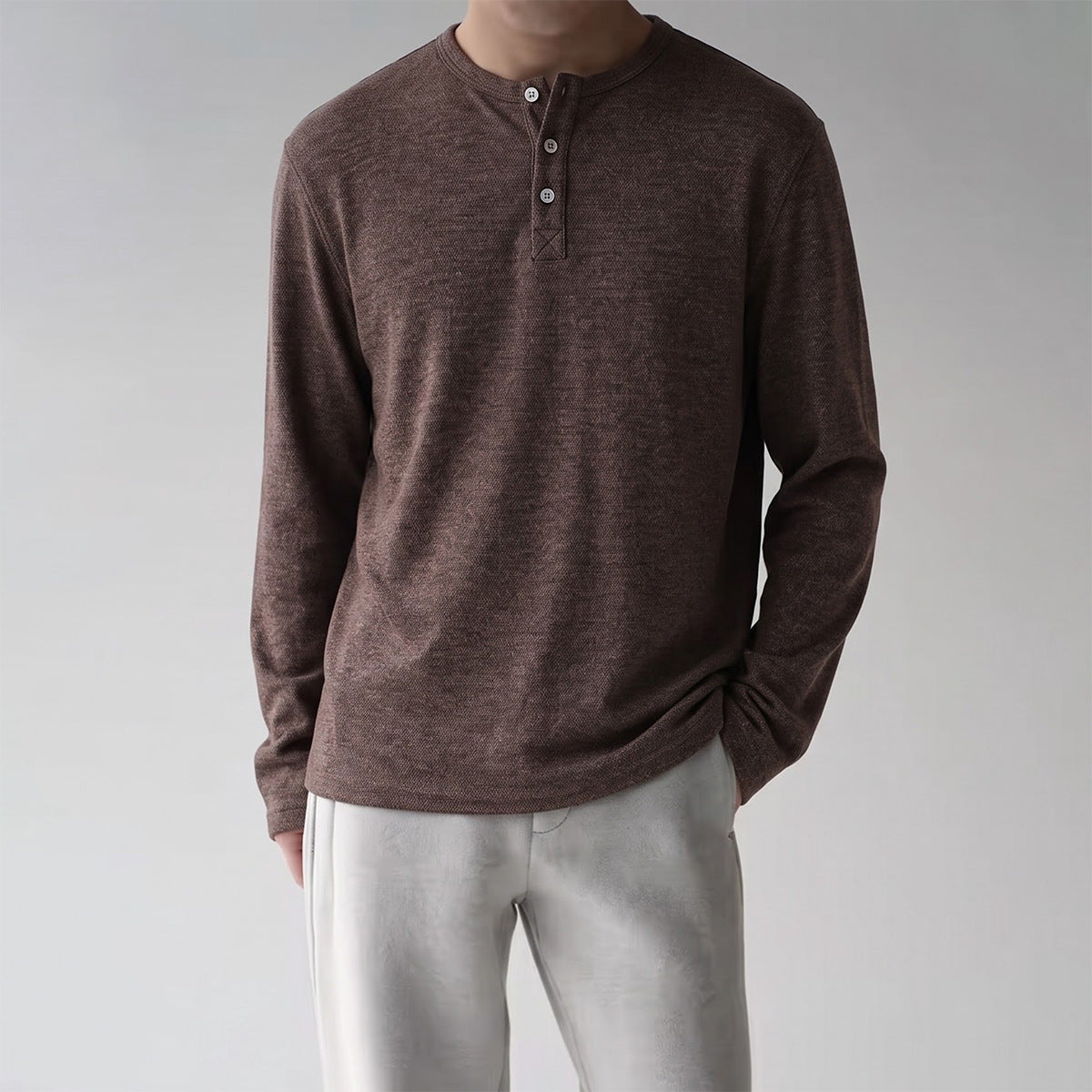 Men's long-sleeve Henley T-shirt in heathered coffee brown with three-button placket and relaxed fit