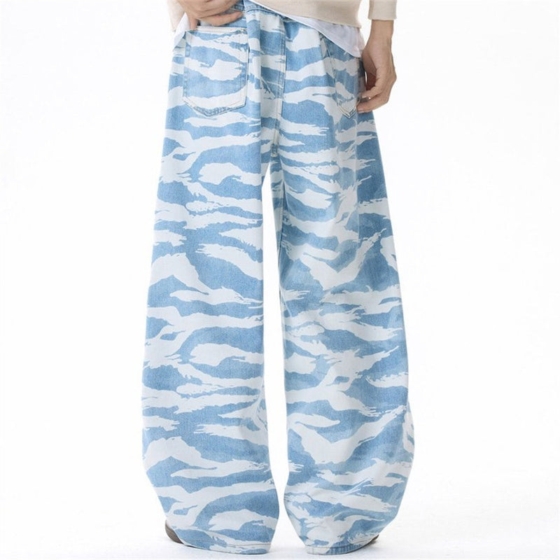 Model view of light blue zebra camo wide-leg jeans with oversized legs