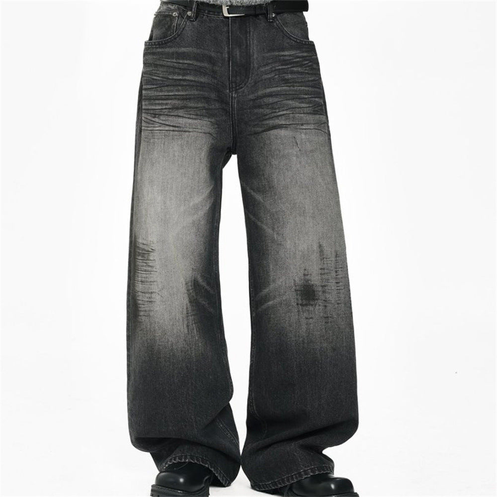 Men's black baggy wide-leg washed vintage distressed denim jeans, front and back view