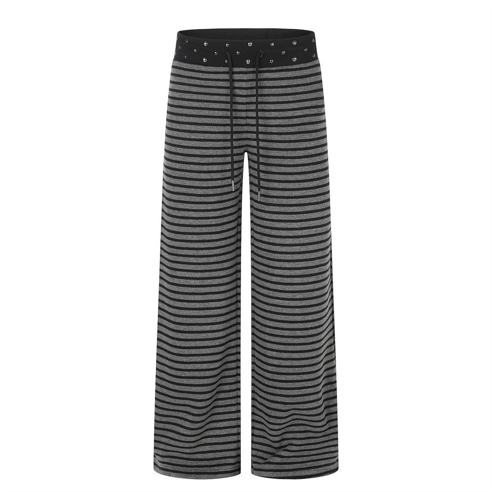 Wide-leg black and grey striped pants with studded drawstring waistband, unisex streetwear style