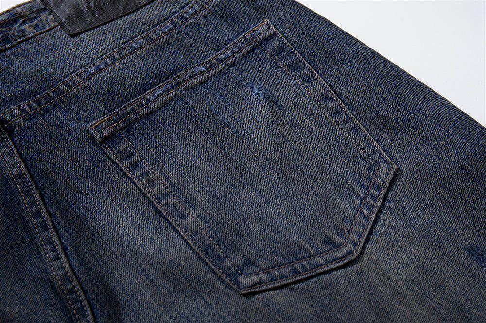 Wide-Leg Ripped Jeans – Vintage Washed Distressed Denim with Studded Patches