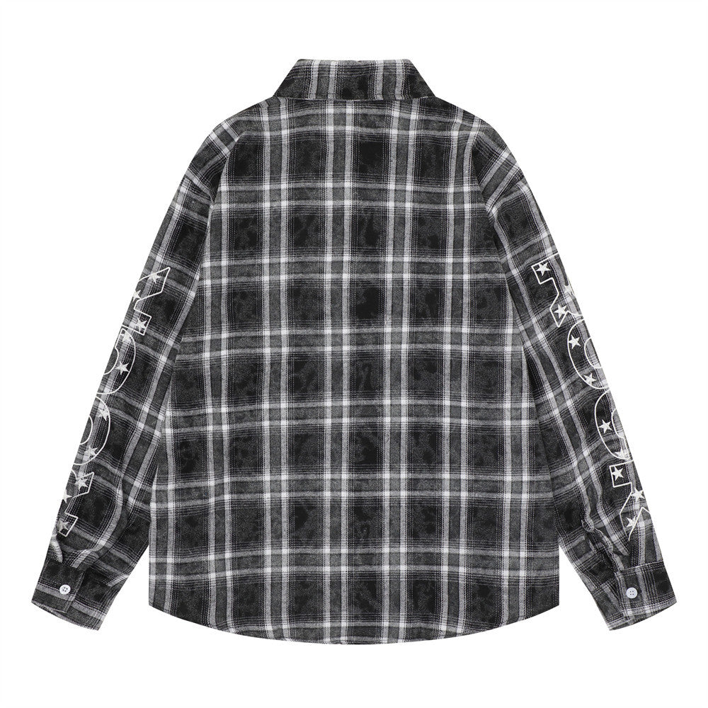 Back view of a black plaid oversized flannel shirt with white sleeve graphics