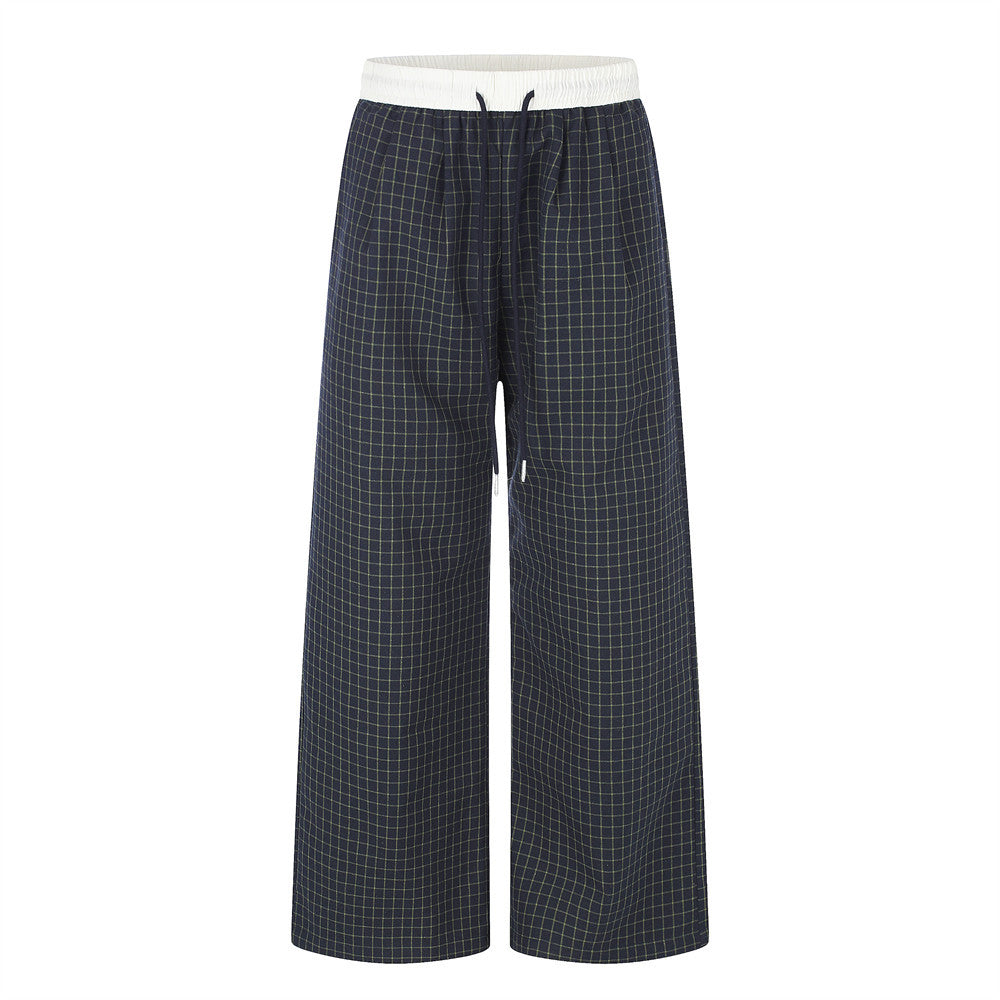 Navy plaid wide-leg pants with contrast white elastic waistband and drawstring, front and back view