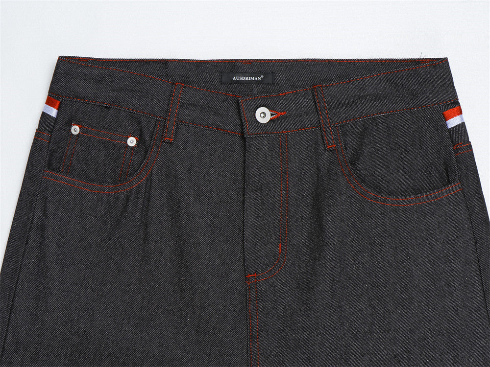Herren-Flare-Jeans in Schwarz mit roter Script-Stickerei – Wide Leg aus Raw Denim