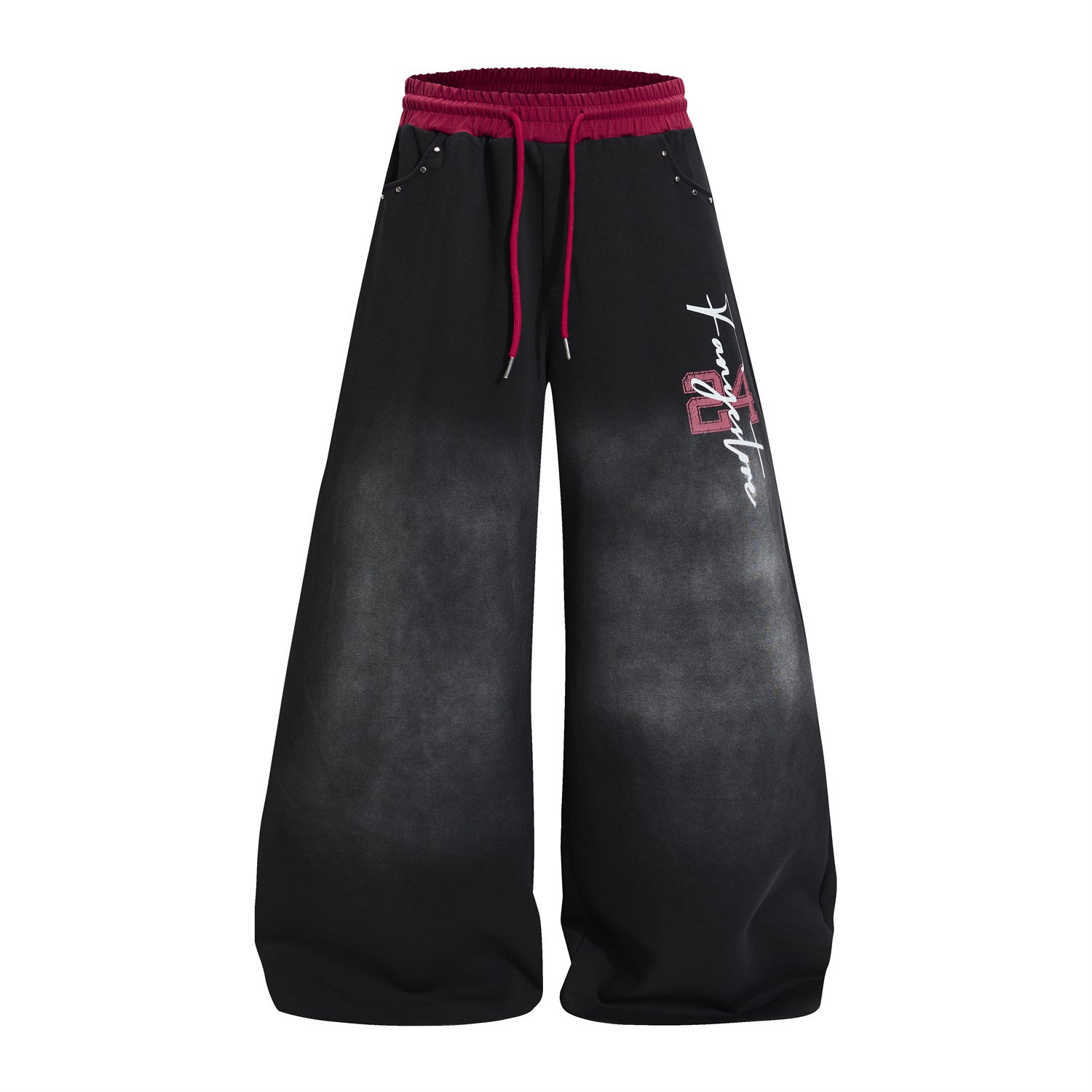 Wide leg acid wash sweatpants in black with contrast red elasticated waistband, varsity graphic print on thigh, and corset la
