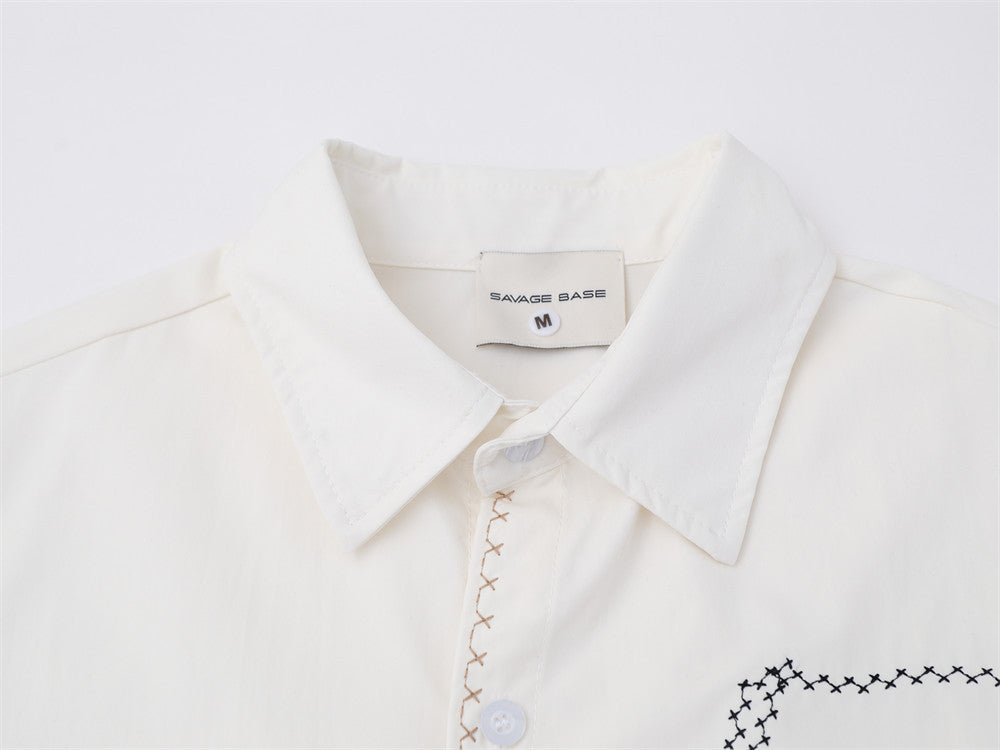 Abstract Face Embroidered Oversized Short-Sleeve Button-Up Shirt