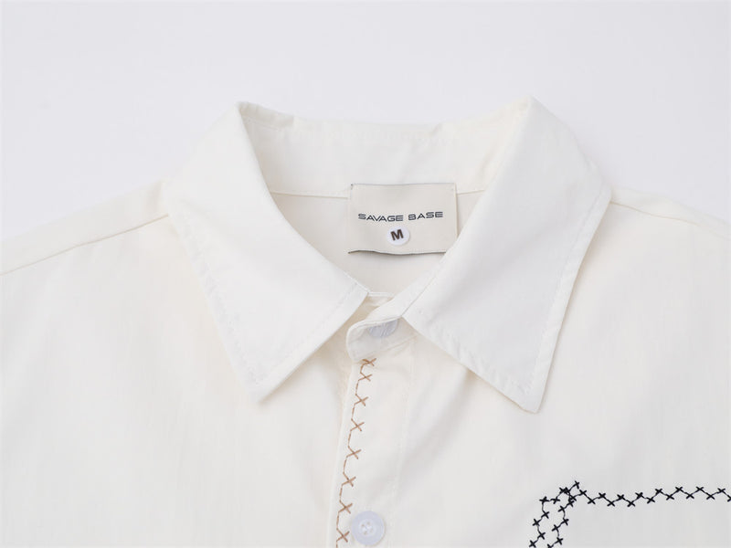 Abstract Face Embroidered Oversized Short-Sleeve Button-Up Shirt