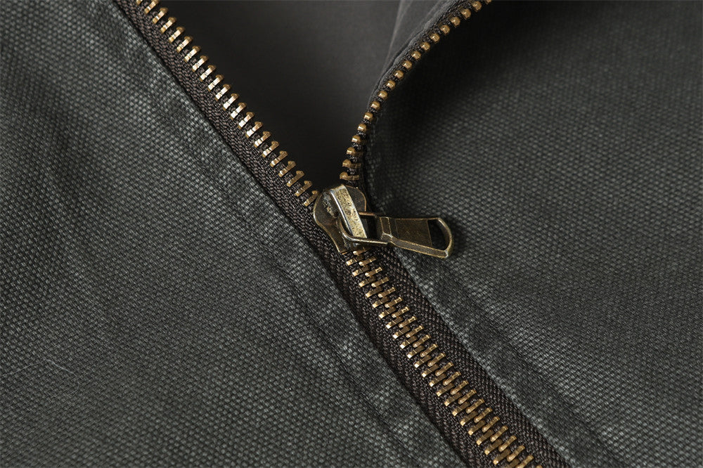 Blouson bomber déconstruit en toile à coutures effilochées et zip diagonal