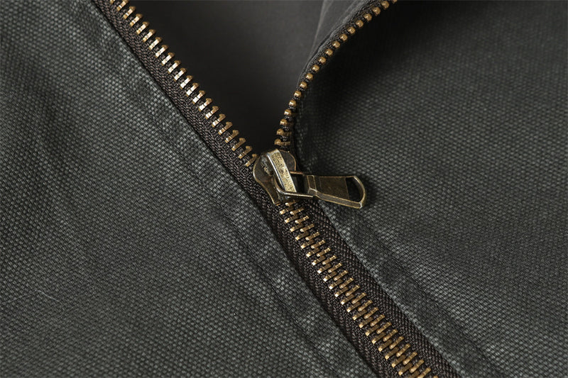 Blouson bomber déconstruit en toile à coutures effilochées et zip diagonal