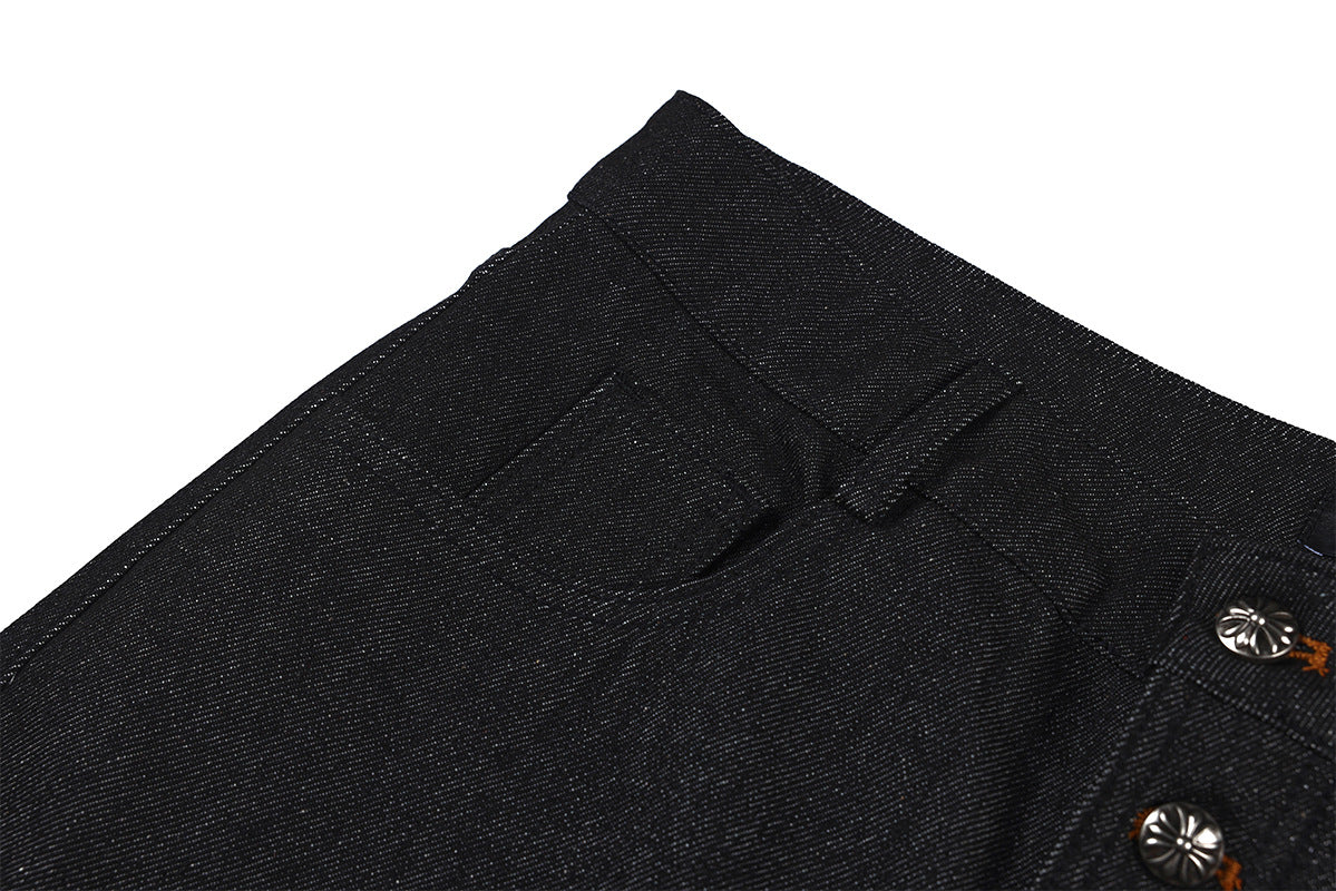 Jean droit noir brut à boutons-pression latéraux