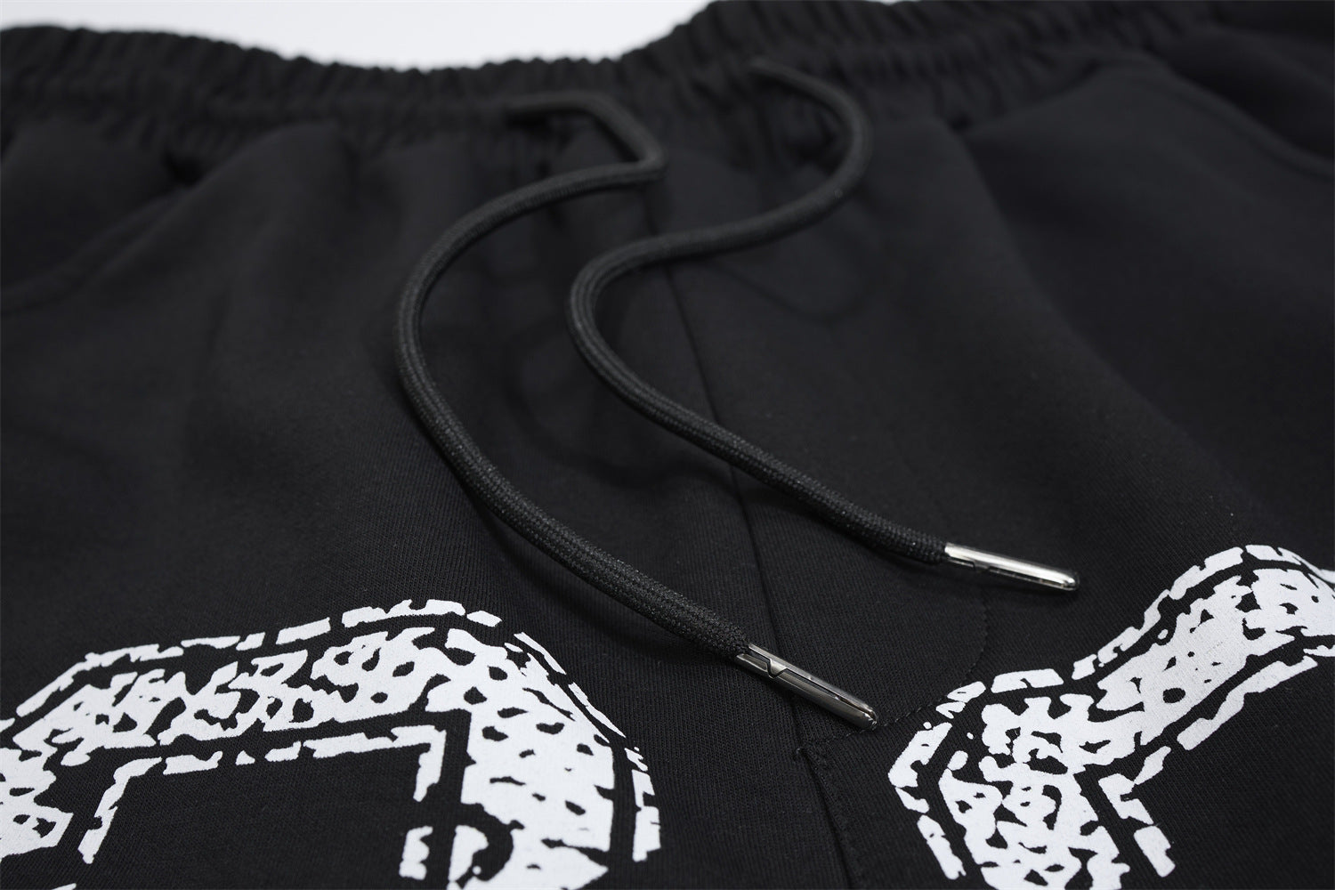 Pantalon de survêtement à jambes larges avec imprimé numéro universitaire et étoile