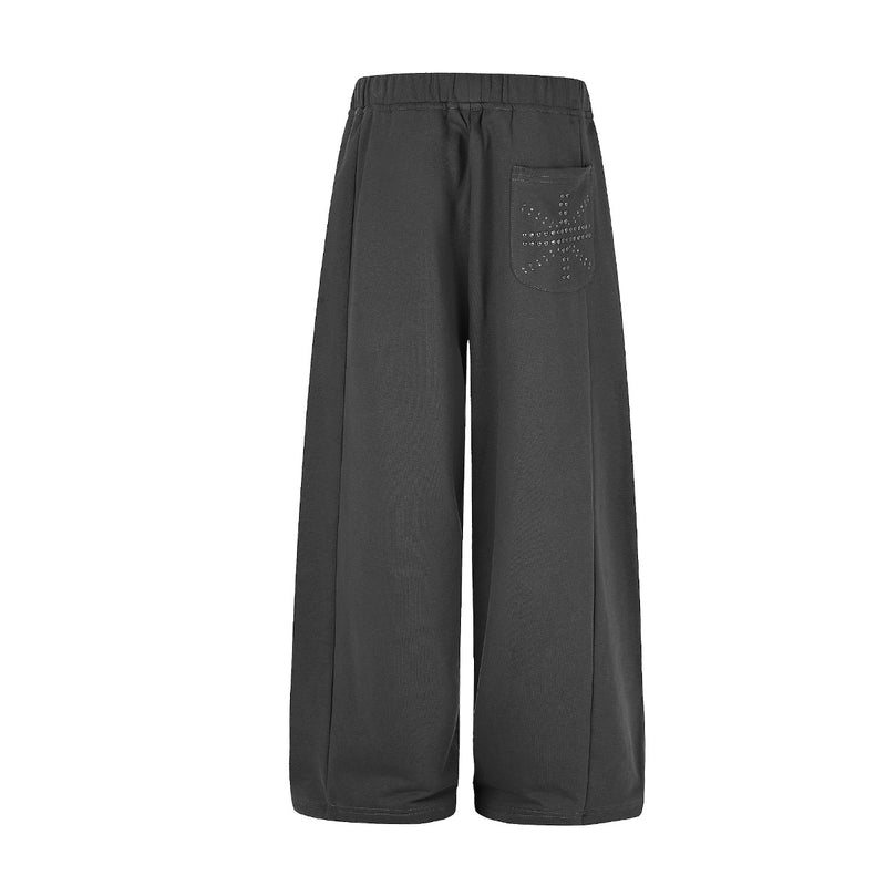 Jogging à jambes larges avec clous – Coupe ample et croix ornée de strass