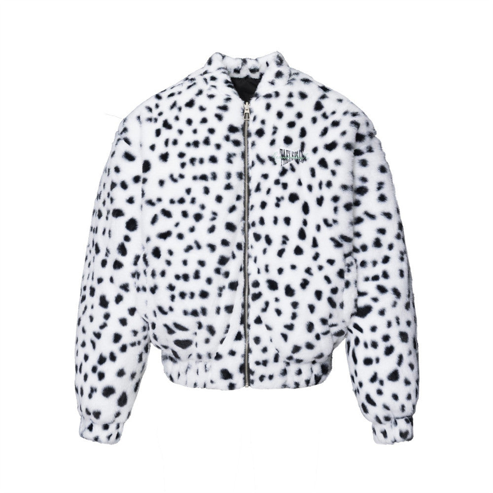 Reversible Dalmatian print faux fur bomber jacket shown in both black shell and white spotted faux fur sides
