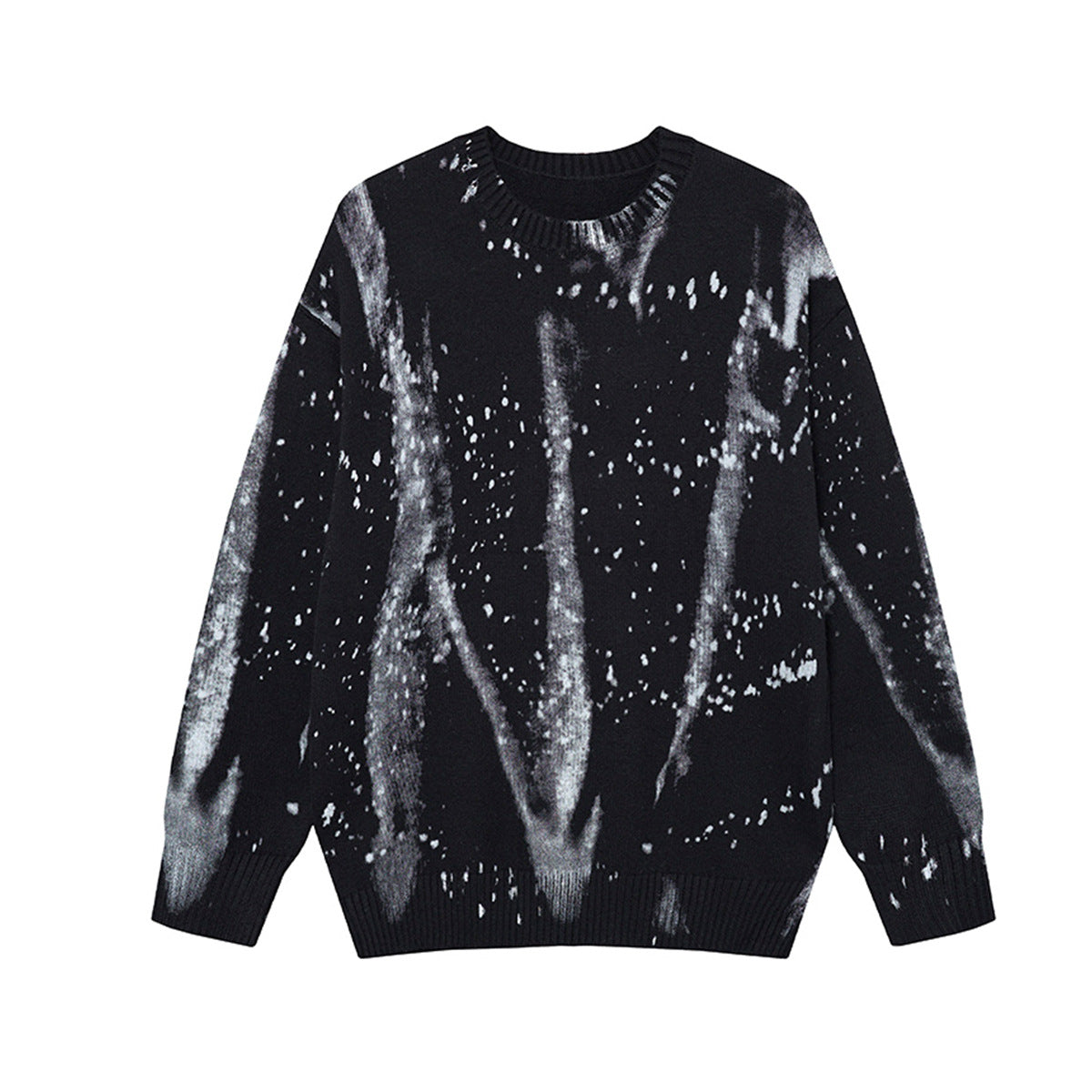 Pull en maille oversize à col rond, avec motif de projections de peinture façon éclaboussures d’encre sur fond noir, vue de face