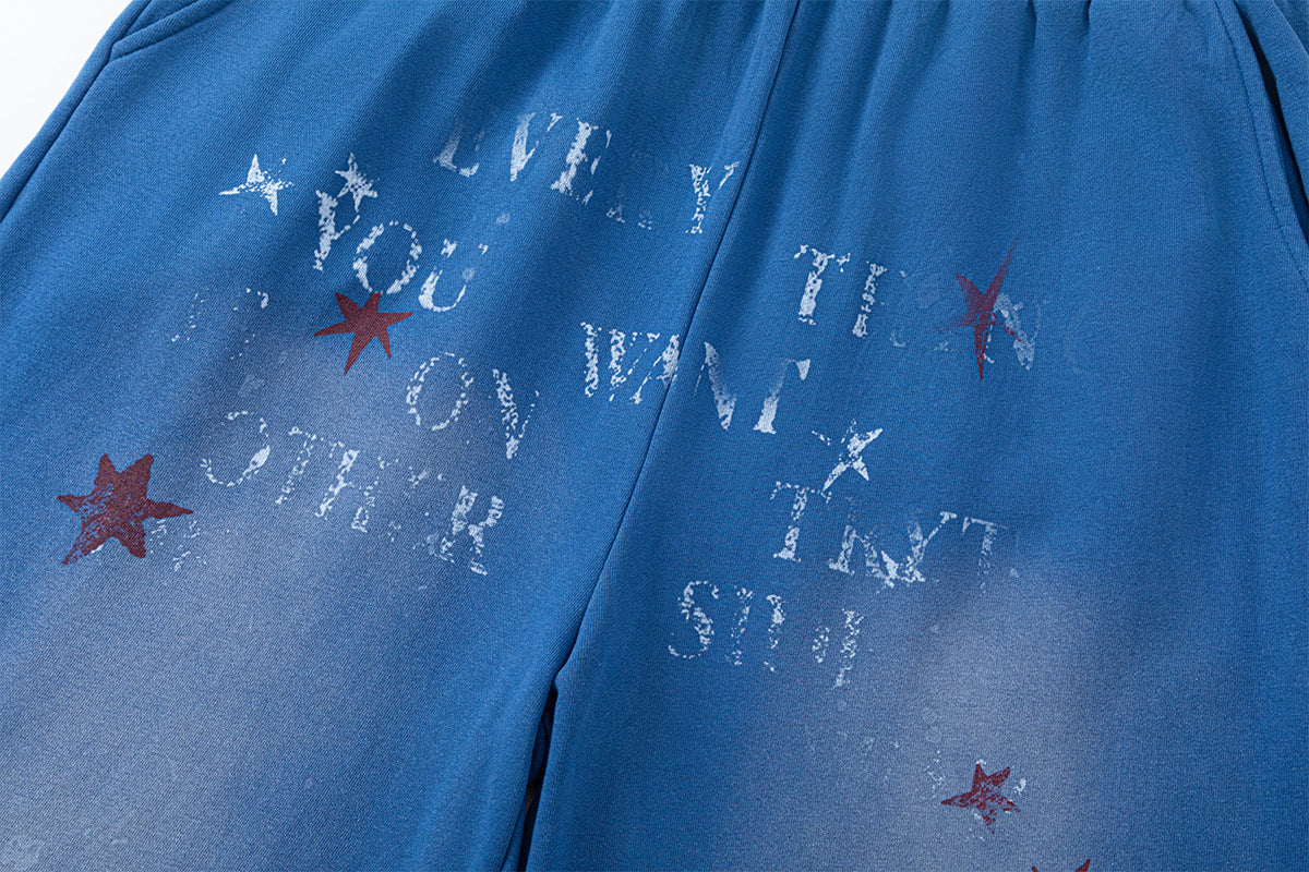 Pantalon de survêtement à jambes larges avec motif d’étoiles et de lettres, coupe décontractée délavée