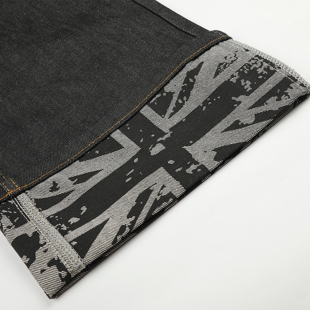 Jean homme à jambes larges – Denim noir, poches arrière cloutées et revers Union Jack