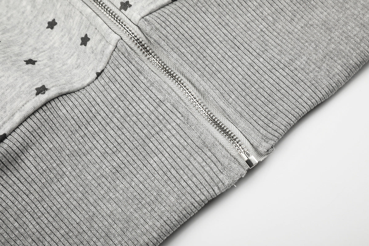 Sweat à capuche zippé court à motif étoiles et croix