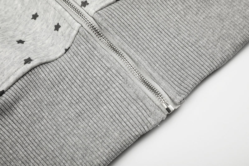 Sweat à capuche zippé court à motif étoiles et croix