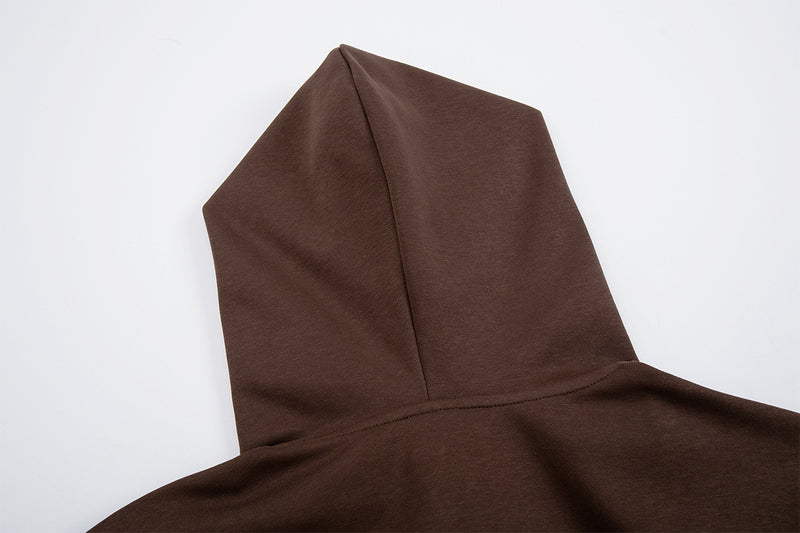 Sweat zippé à capuche avec croix brodée et détail à carreaux sur le bas