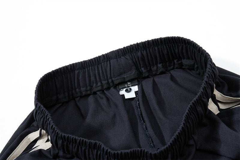 Pantalon de survêtement wide leg – Triple bande latérale, taille élastique à cordon