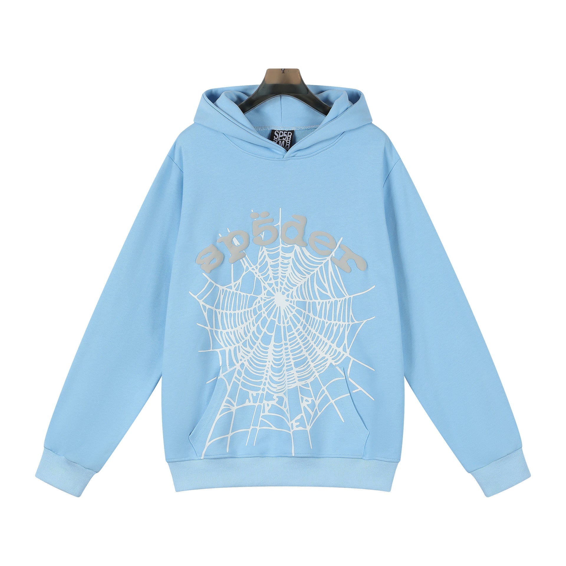The Sp5der Hoodie – Sky Blue Web 440GSM Heavyweight Streetwear Pullover showcases a large white spider web and beige "sp5der" lettering on soft cotton fleece, displayed on a hanger with a white background.