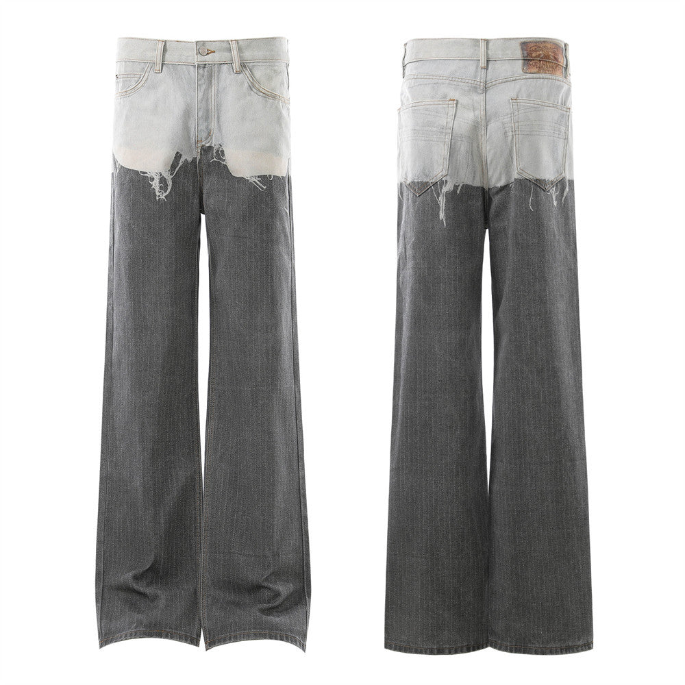 Two-tone contrast wash wide-leg jeans with bleached light grey upper body and dark charcoal lower leg, front and back view