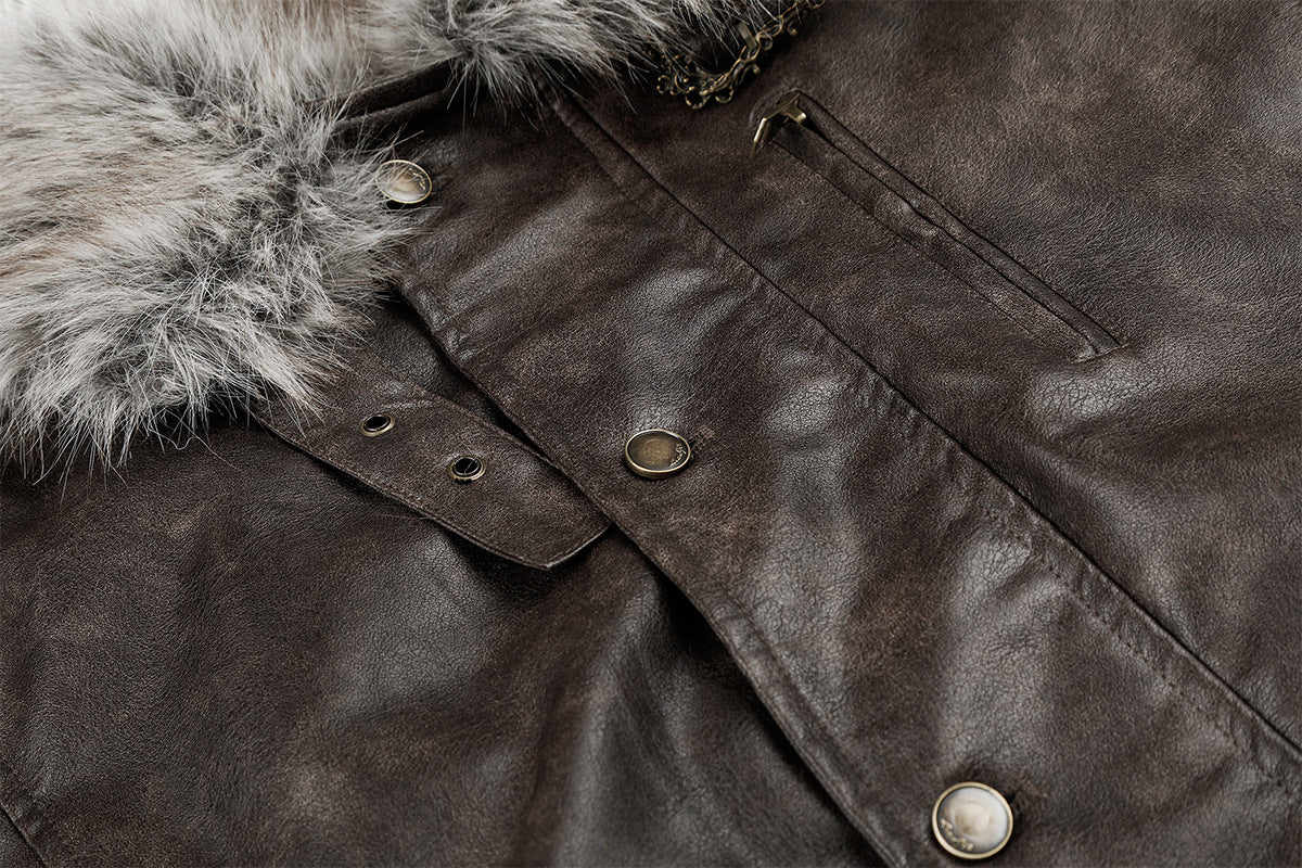 Close-up of brown faux leather front with snap buttons, flap, zipper pocket, and fur trim