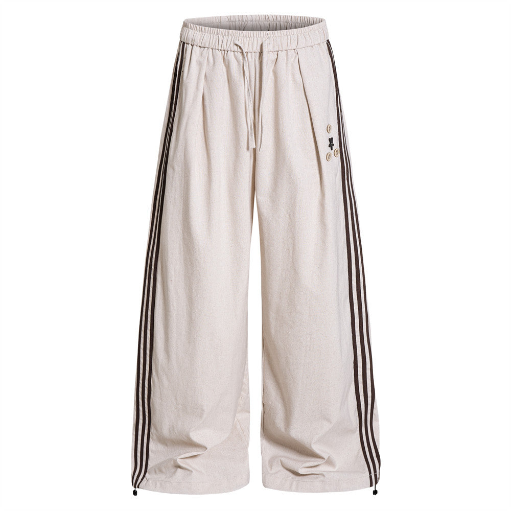 Pantalon de survêtement pour homme à jambes larges, avec trois bandes latérales et taille élastique à cordon, crème et bleu marine
