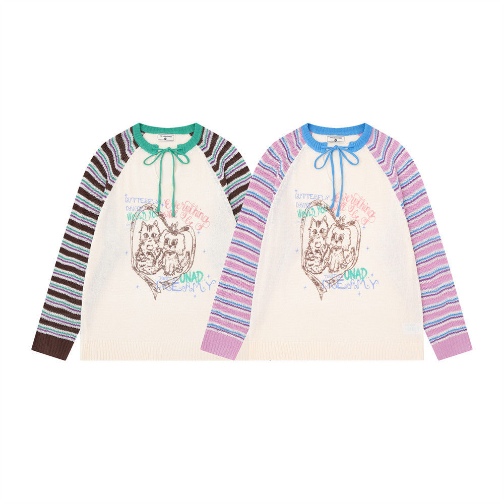Pull en maille rayé colorblock à manches raglan avec col à lien