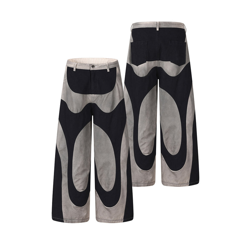 Wide-Leg-Patchworkhose – abstraktes Wellenmuster aus zweifarbigem, schwarz-grauem Washed-Denim