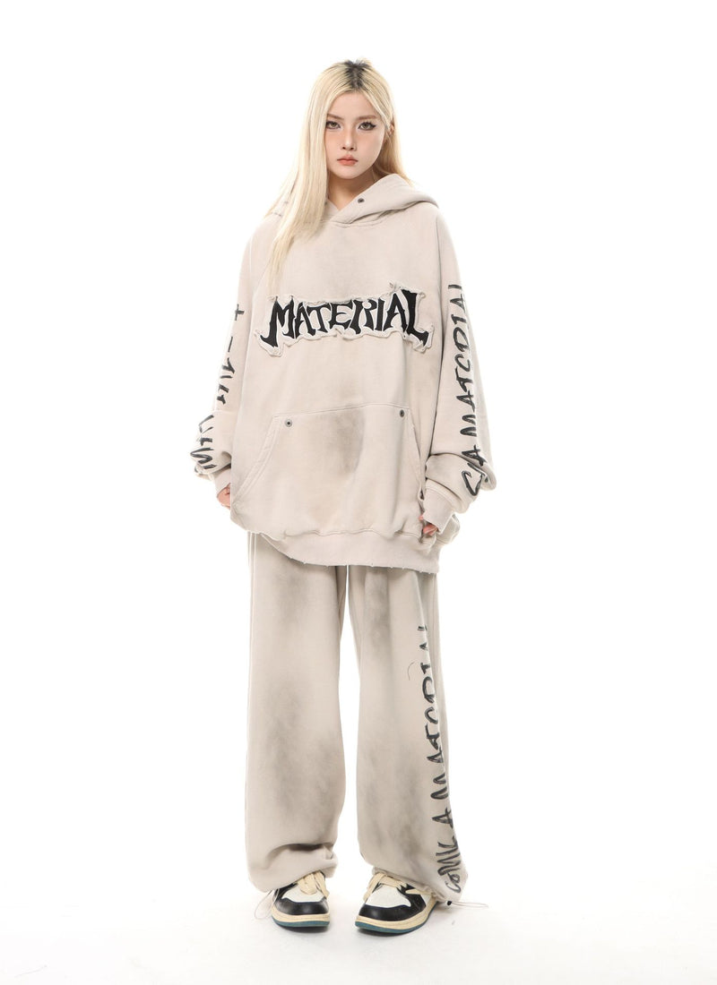 Oversized washed heavy fleece hoodie with gothic MATERIAL embroidered chest patch and sleeve text print in sand beige