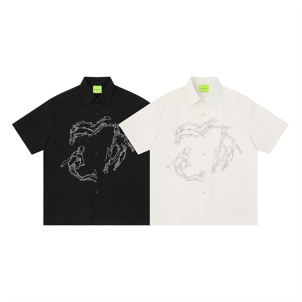 Oversized short sleeve button-up shirt with abstract line art figure embroidery on the front, available in black and off-whit