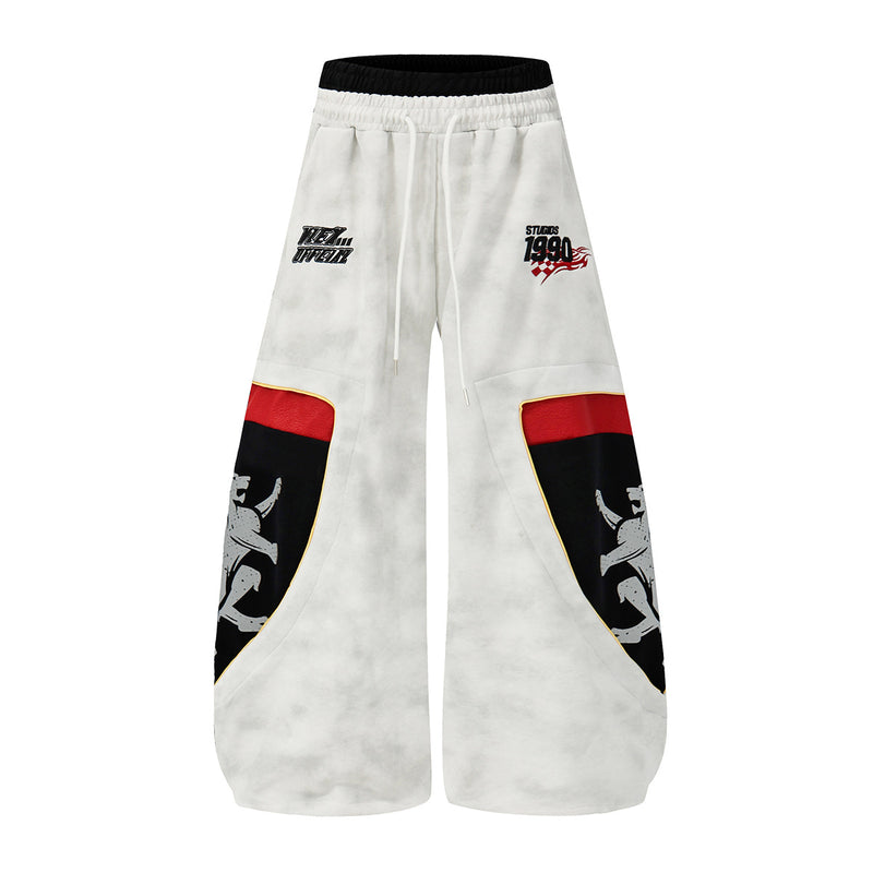 Pantalon de survêtement à jambes larges avec motif bouclier lion chevalier rétro – Gris délavé