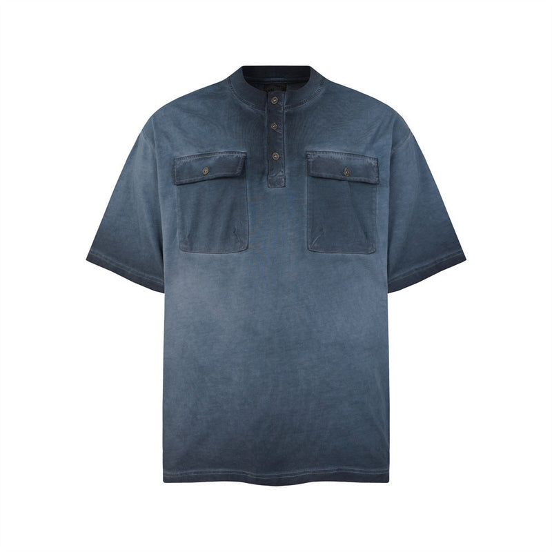 Oversized acid wash Henley t-shirt with dual chest pockets and gradient fade in slate blue, front view
